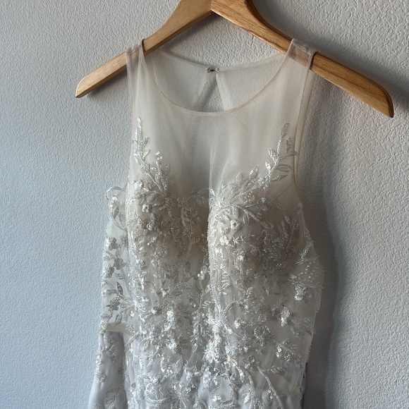 Jovani Scoop neck flower embellished bodice with mesh and a feathered Miniskirt. - Picture 6 of 10